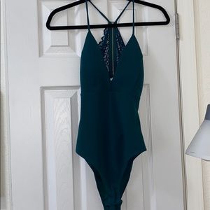 Emerald green bodysuit